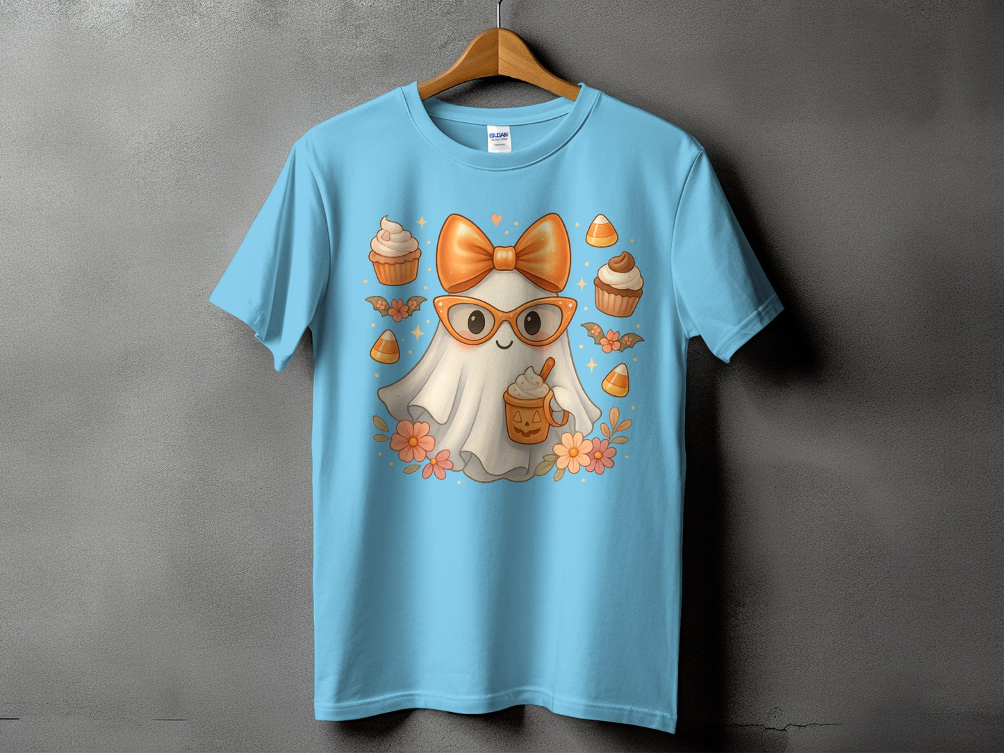 Light blue t-shirt with a kawaii ghost graphic and Halloween treats.