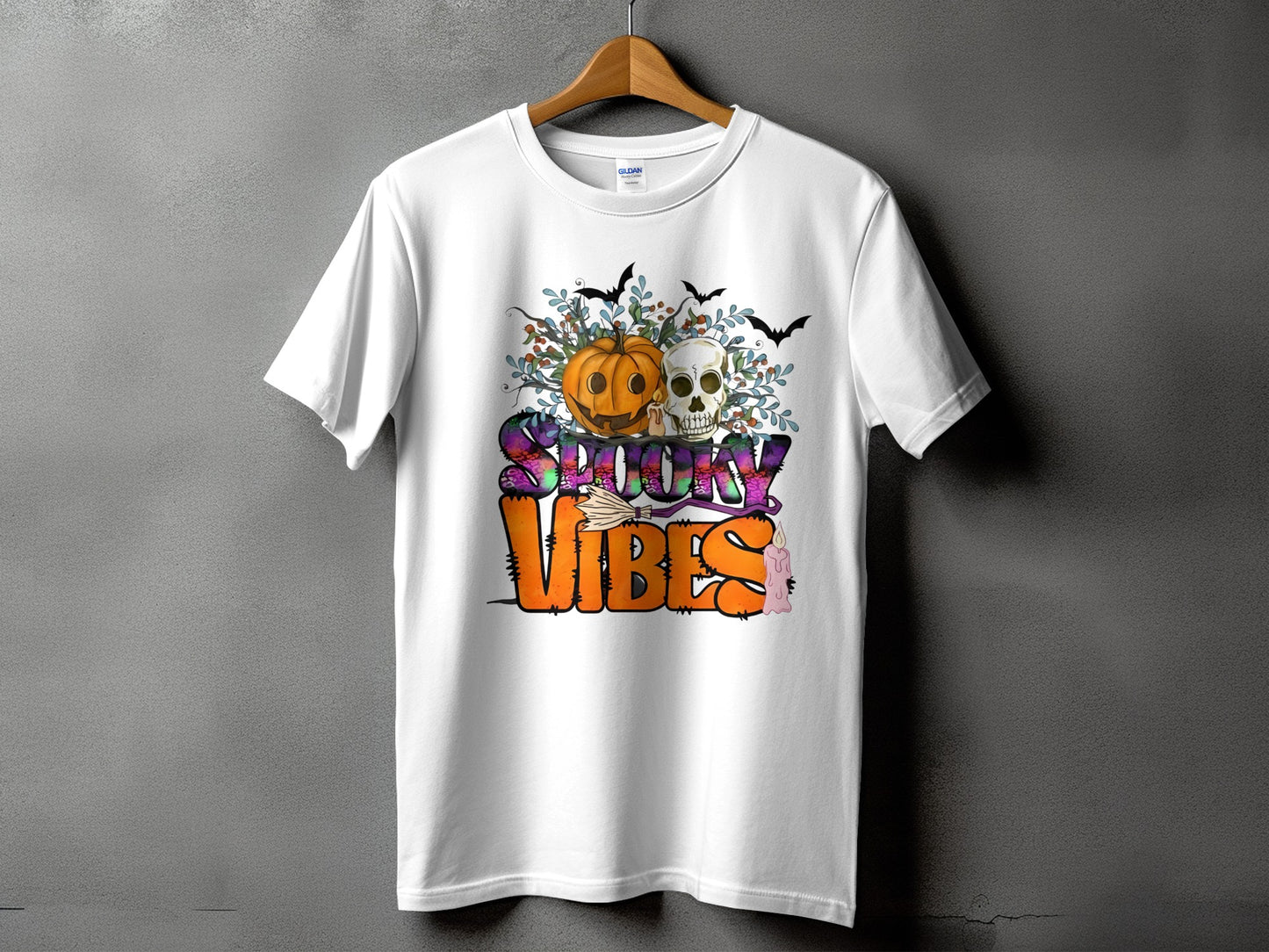 White t-shirt with "Spooky Vibes" text and Halloween graphic.
