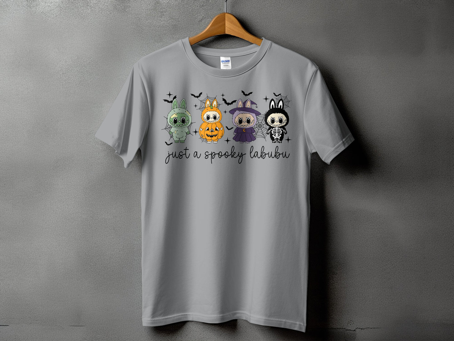 Grey t-shirt with four cute Halloween characters and "just a spooky labubu" text.
