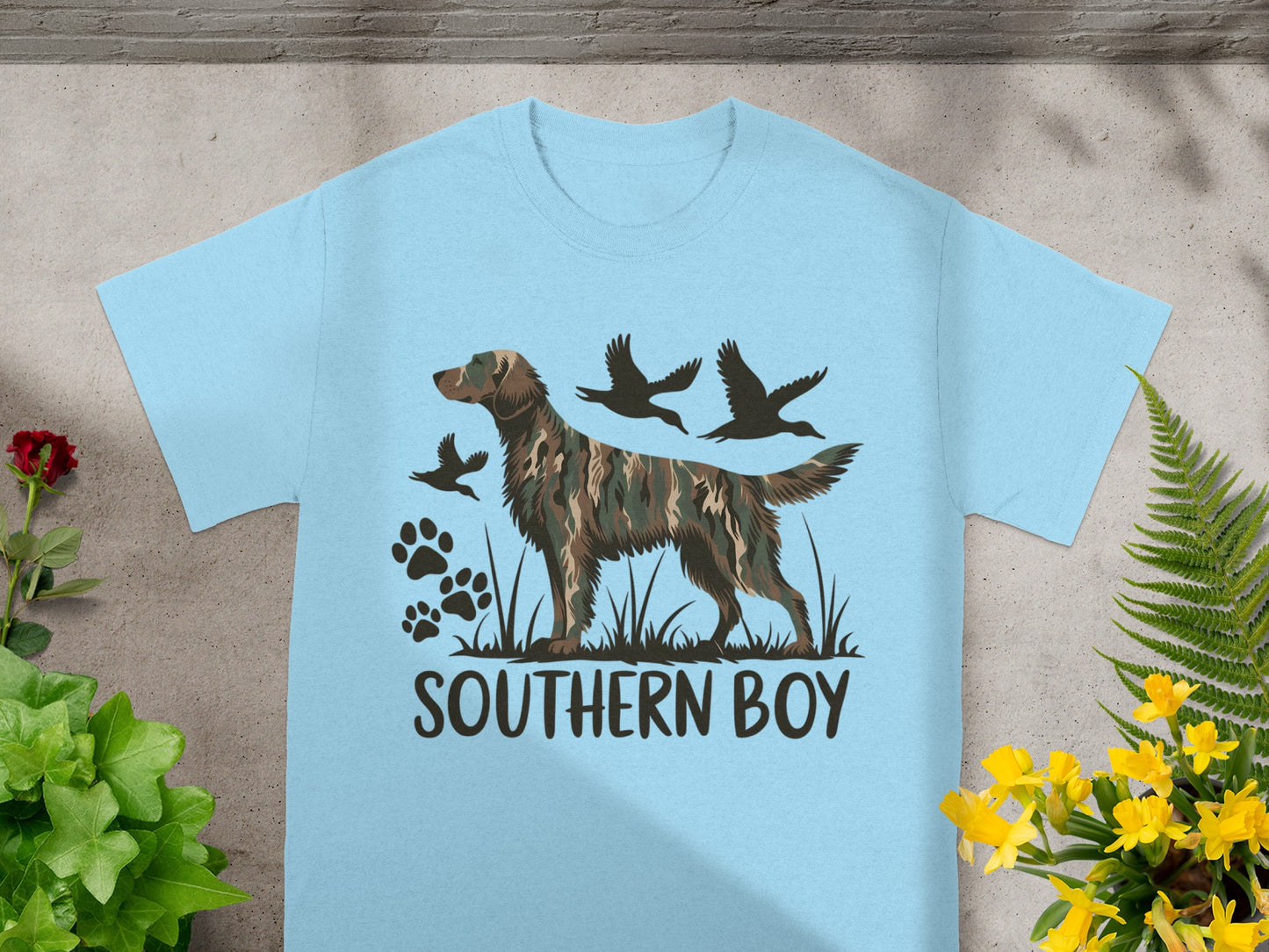 Light blue t-shirt with illustration of dog, ducks, and text "SOUTHERN BOY."