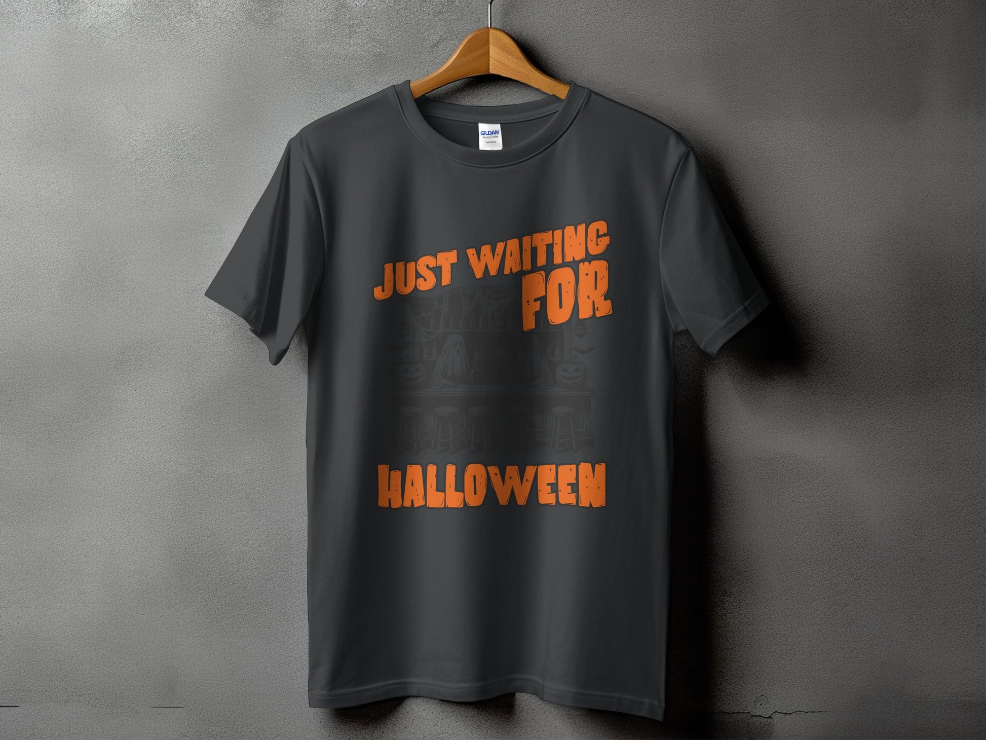 Dark gray t-shirt with orange text reading "JUST WAITING FOR HALLOWEEN".