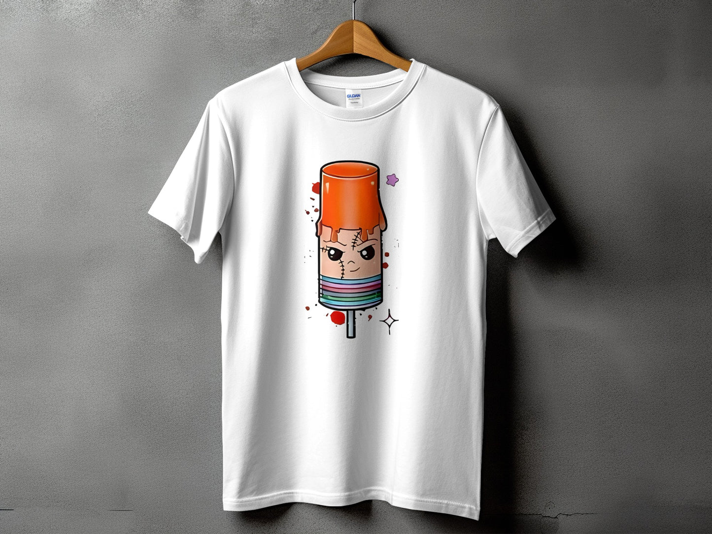 White t-shirt with a cartoon popsicle design featuring stitched details and a star.