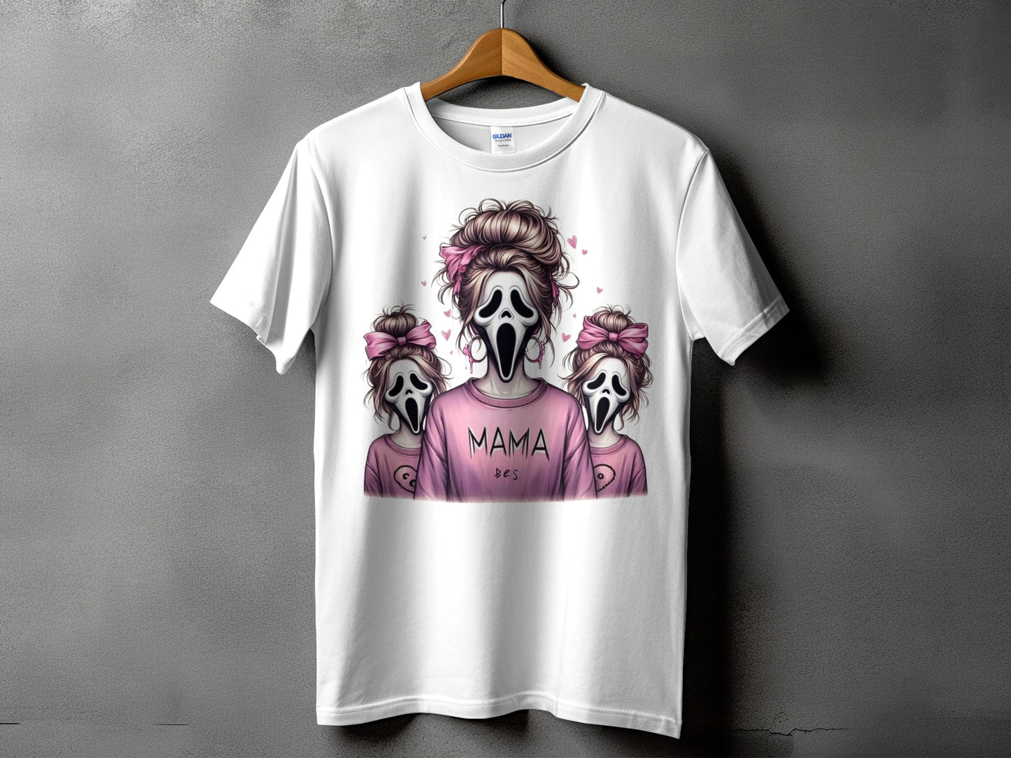 White t-shirt with three ghost characters, two small and one large, wearing pink shirts.