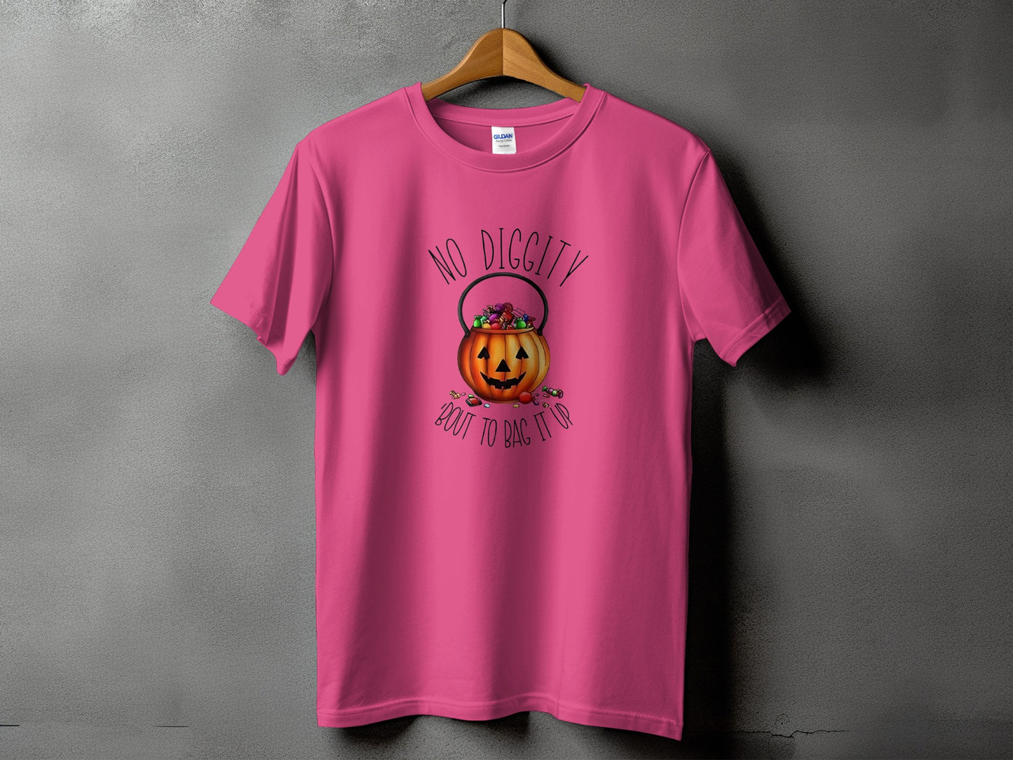 Pink t-shirt with "No Diggity Bout to Bag It Up" text and pumpkin candy bucket.