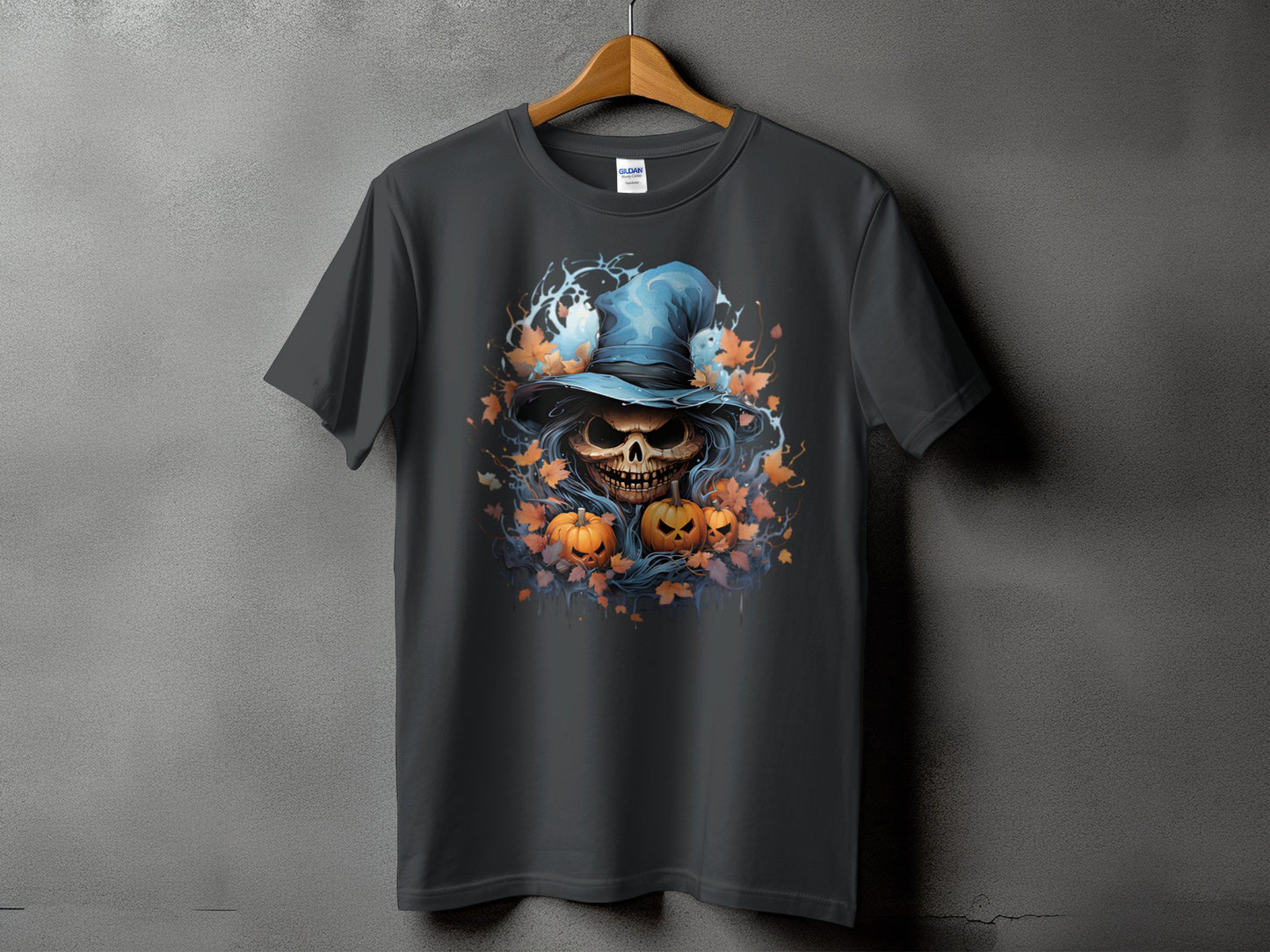 Dark t-shirt with Halloween skull, pumpkins, and witch hat graphic.