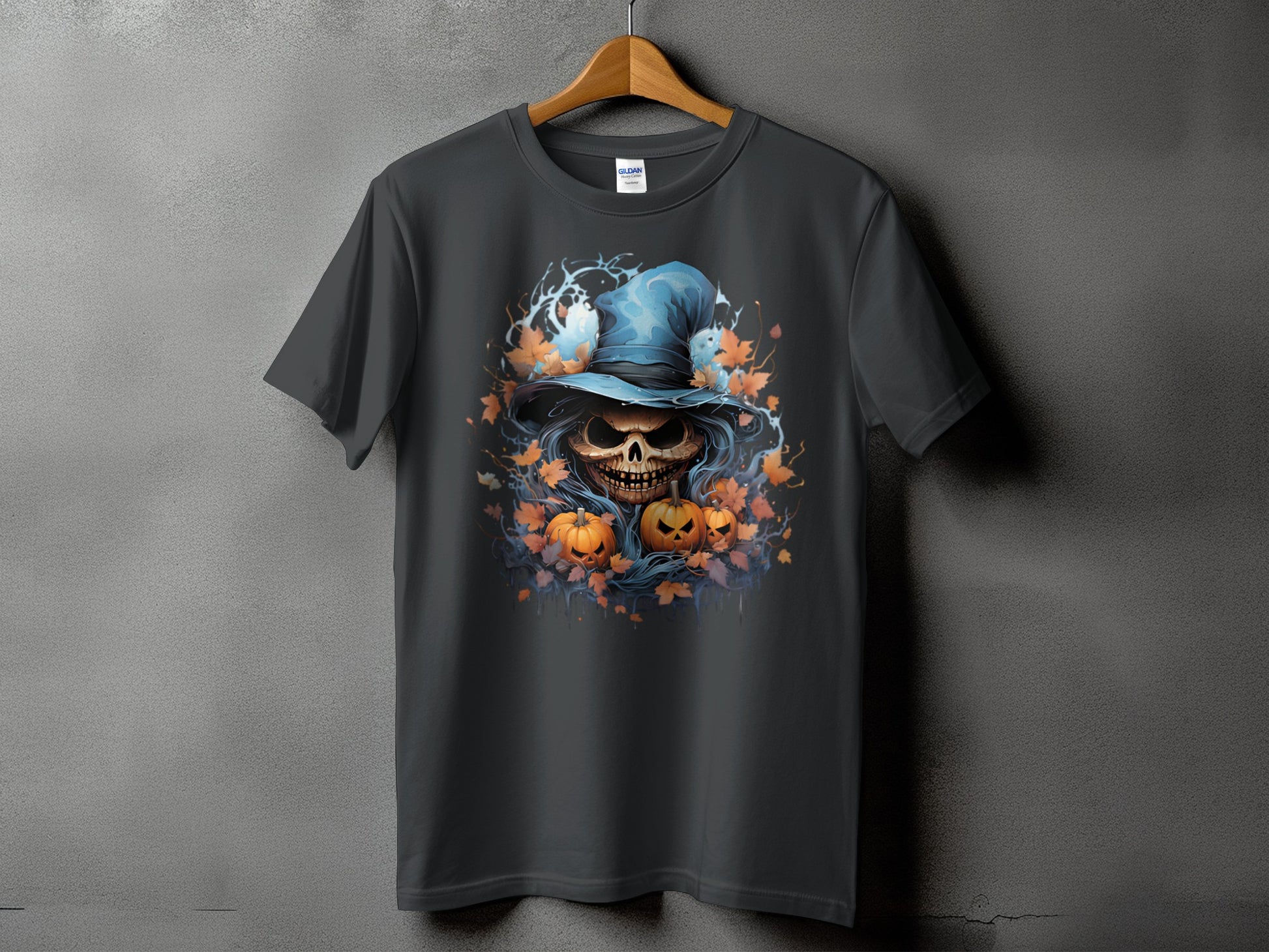 Dark t-shirt with Halloween skull, pumpkins, and witch hat graphic.