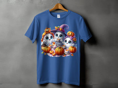 Three cute ghosts with pumpkins and tea set on a plaid blanket.