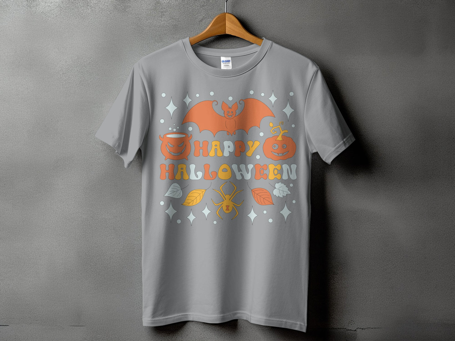 Grey t-shirt with retro Halloween graphic featuring bat, pumpkins, spider, and text.