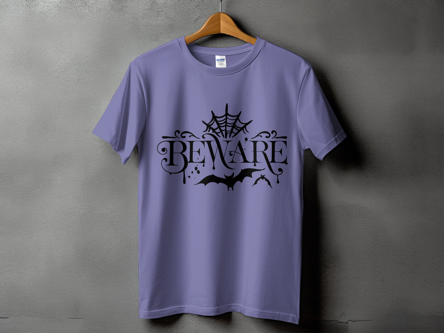 Purple t-shirt with black "Beware" text, spiderweb, and bats design.