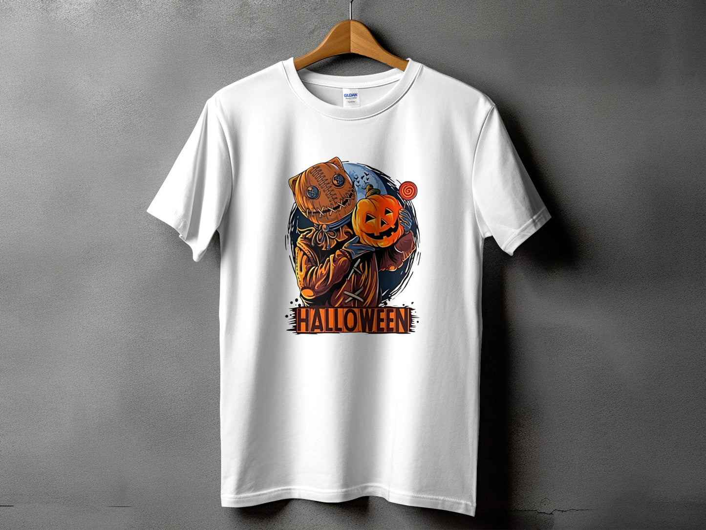 White t-shirt featuring a stitched scarecrow holding a pumpkin and the word HALLOWEEN.