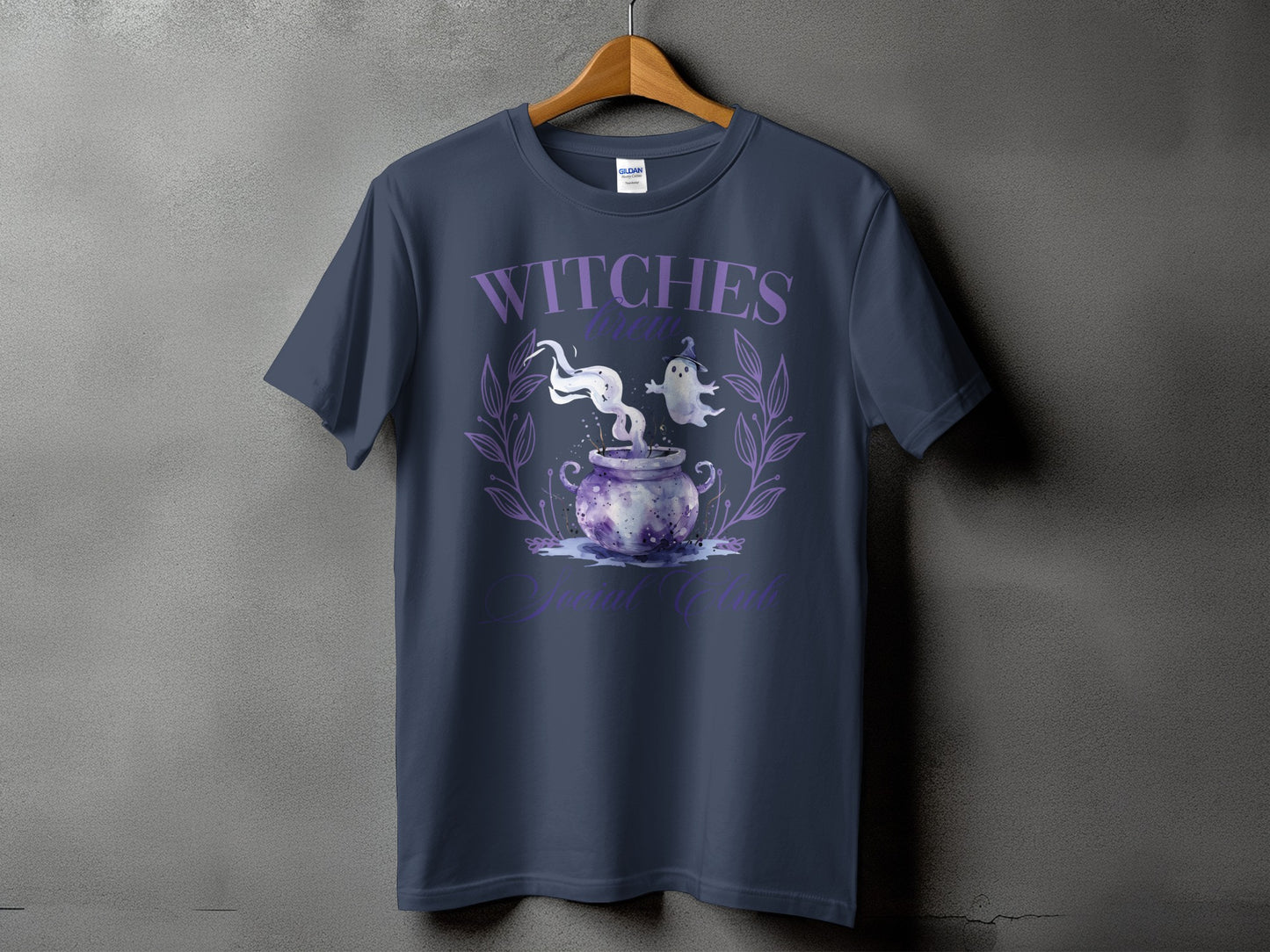 Dark gray t-shirt with "Witches Brew Social Club" text and Halloween graphics.