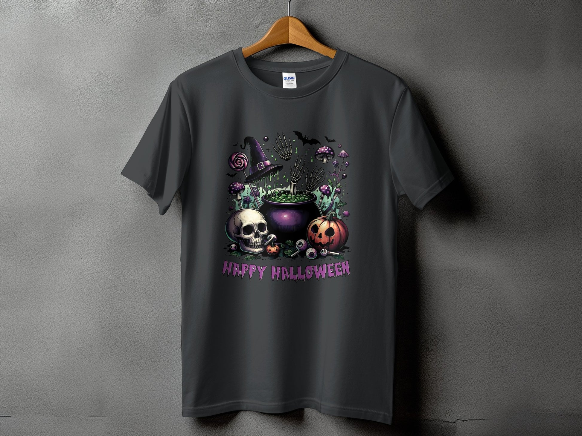 Dark gray t-shirt with Halloween graphic featuring cauldron, skull, pumpkin, and bats.