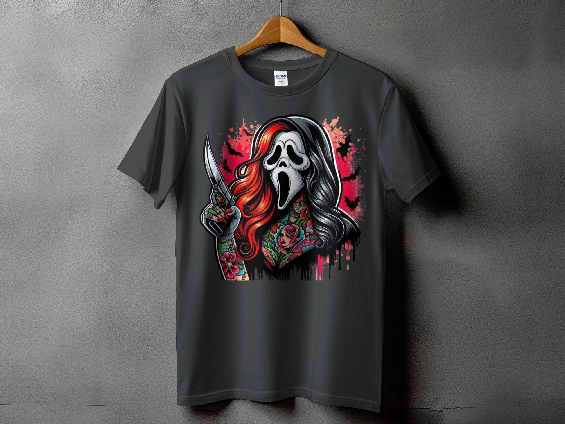 T-shirt with a horror-themed graphic of a tattooed character in a ghost mask holding a knife.