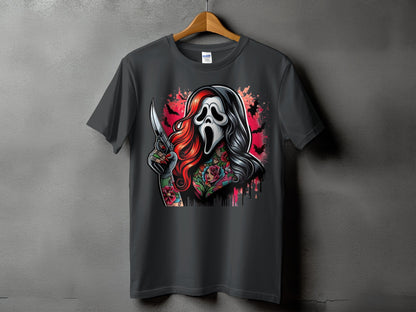 T-shirt with a horror-themed graphic of a tattooed character in a ghost mask holding a knife.