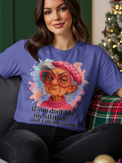 Purple t-shirt with a cartoon of an older woman saying "if you don't like, my attitude, quit talking to me."