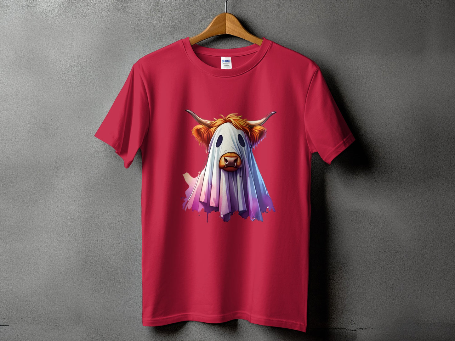 Red t-shirt with a cartoon Highland cow dressed as a ghost.