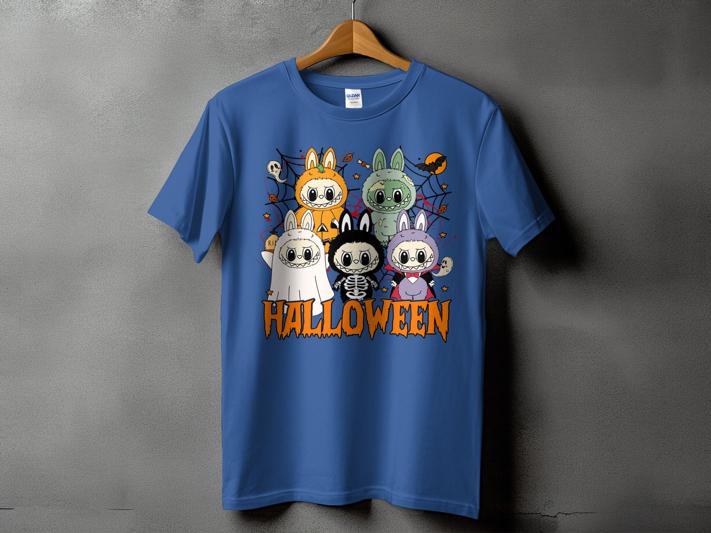Blue t-shirt with cartoon Halloween characters and "HALLOWEEN" text.