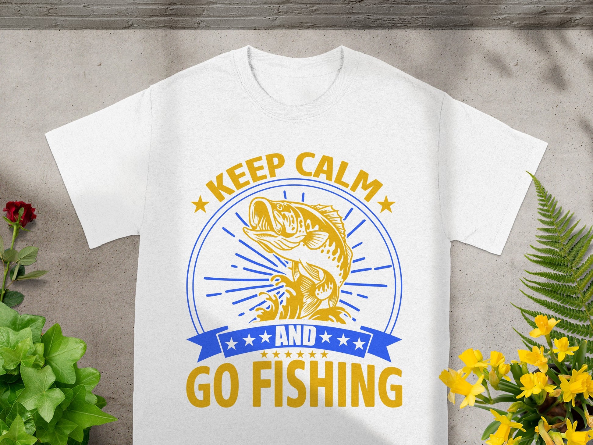White t-shirt with yellow text "KEEP CALM AND GO FISHING" and a bass fish graphic.