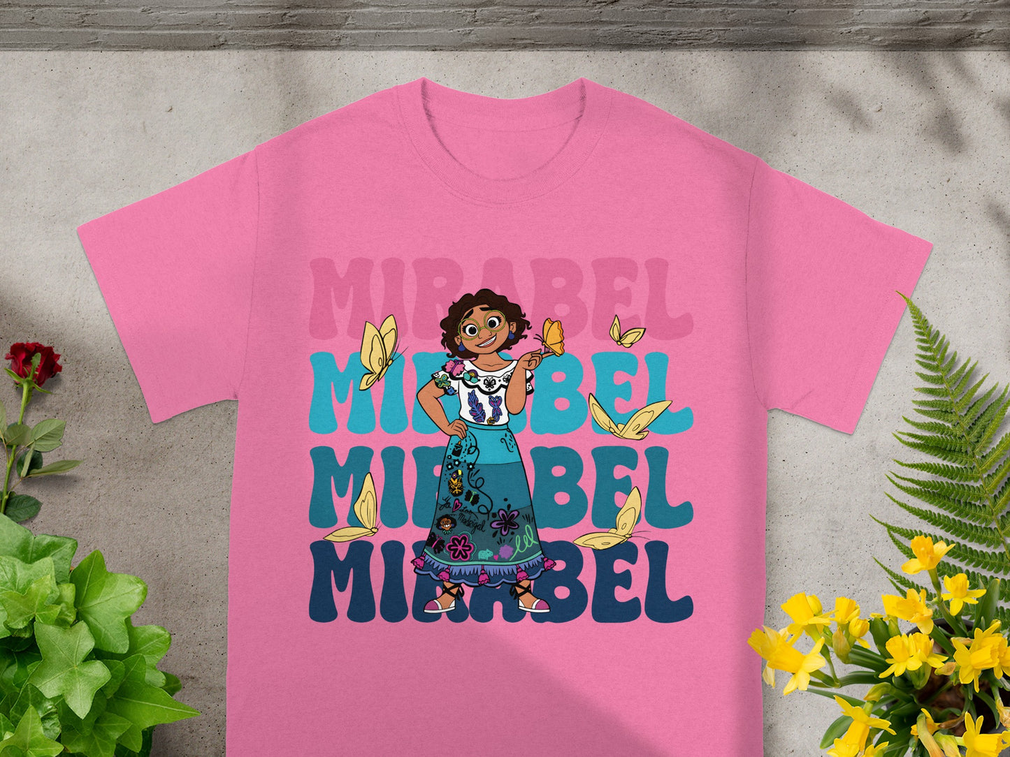 Pink t-shirt with Mirabel Madrigal and "Mirabel" text.