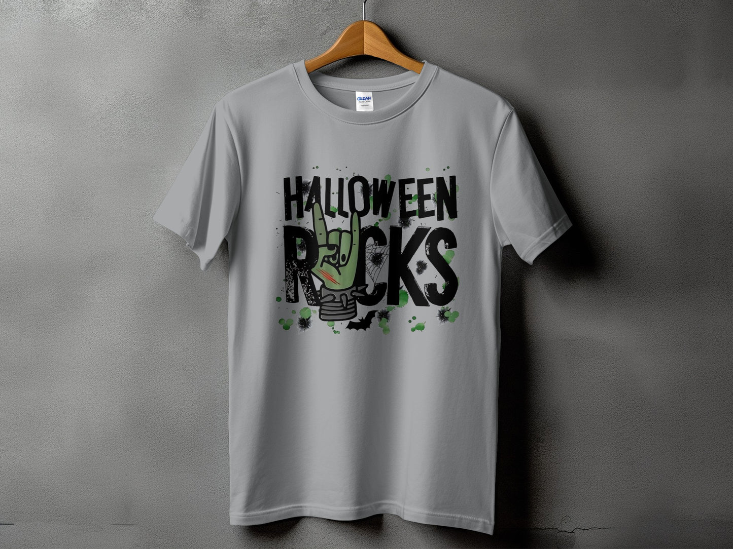 Grey t-shirt with "HALLOWEEN ROCKS" text featuring a zombie hand and Halloween graphics.