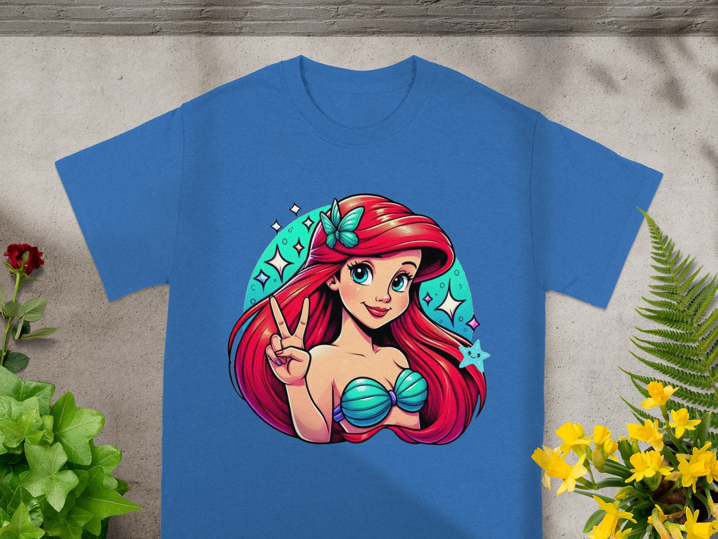 Ariel from The Little Mermaid on a blue t-shirt, peace sign.