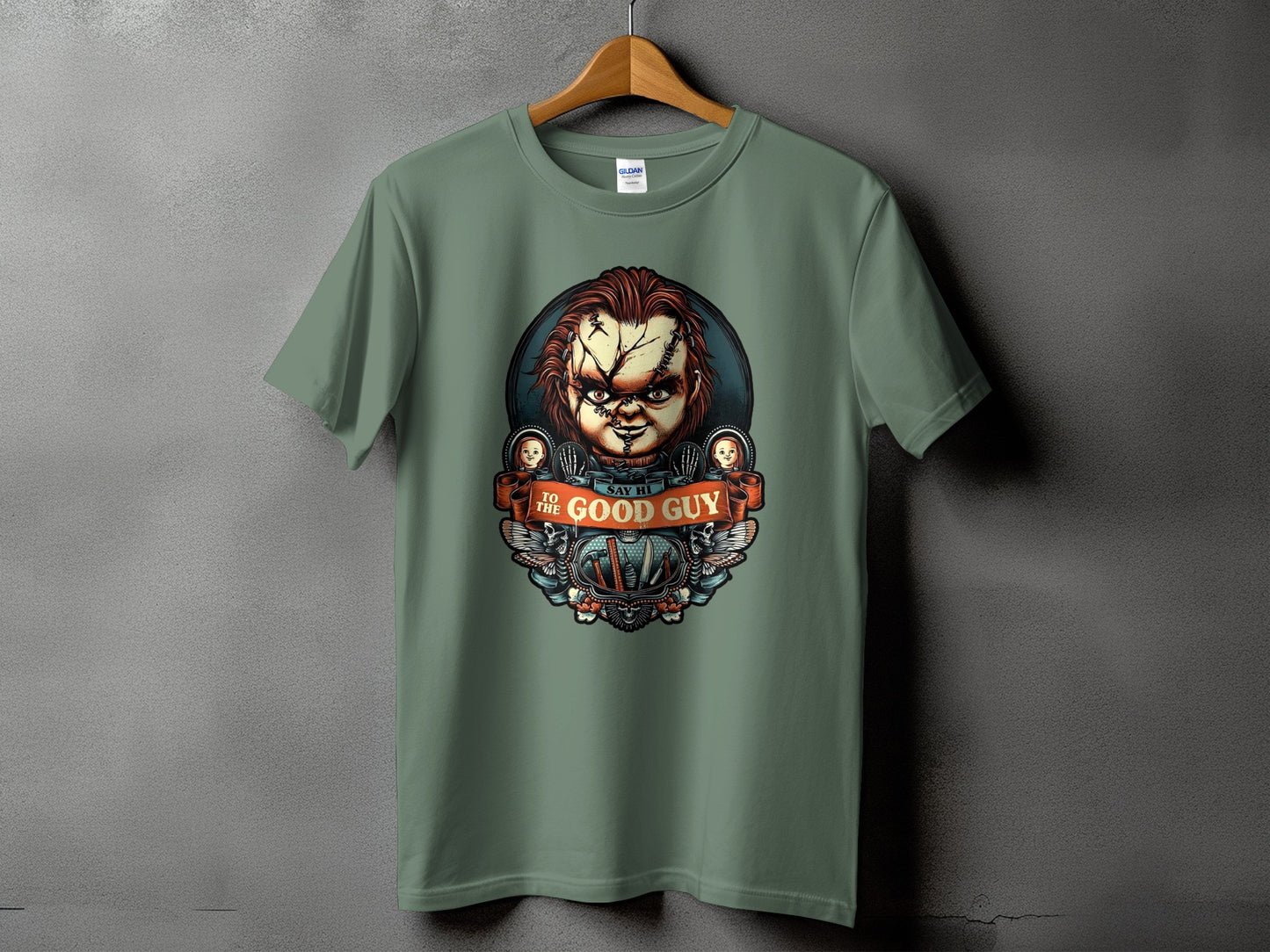 Green t-shirt with a Chucky doll graphic that says "Say Hi to the Good Guy".