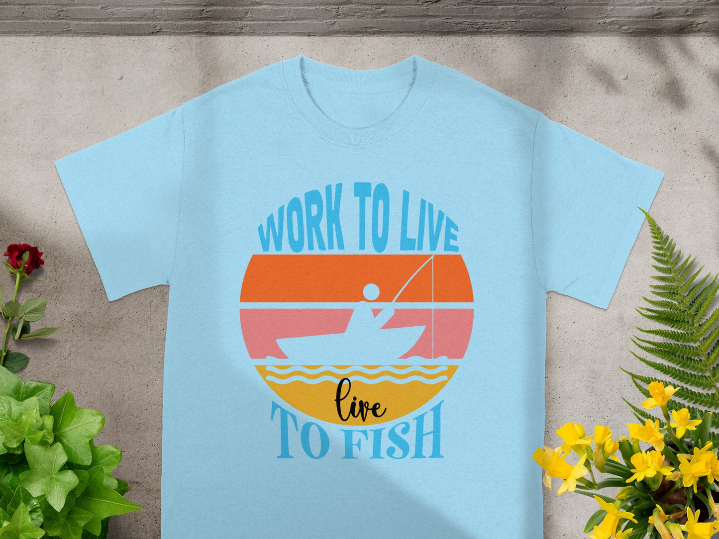 Light blue t-shirt with "WORK TO LIVE" and "live TO FISH" text and fishing graphic.
