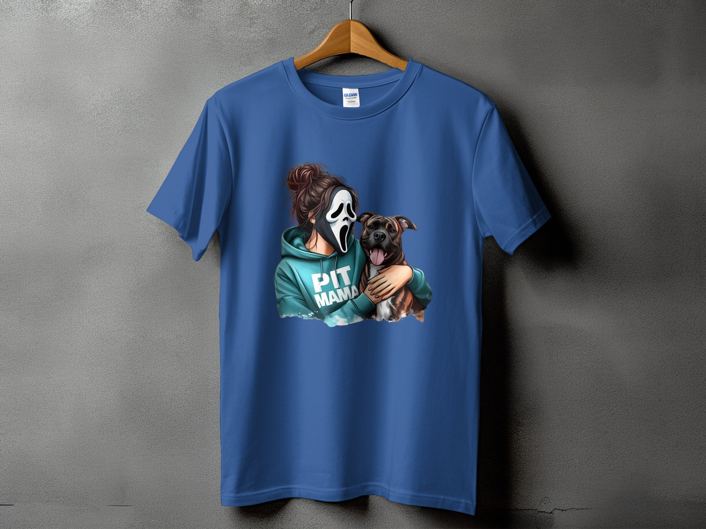 Blue t-shirt with a graphic of a person wearing a scream mask holding a pit bull.