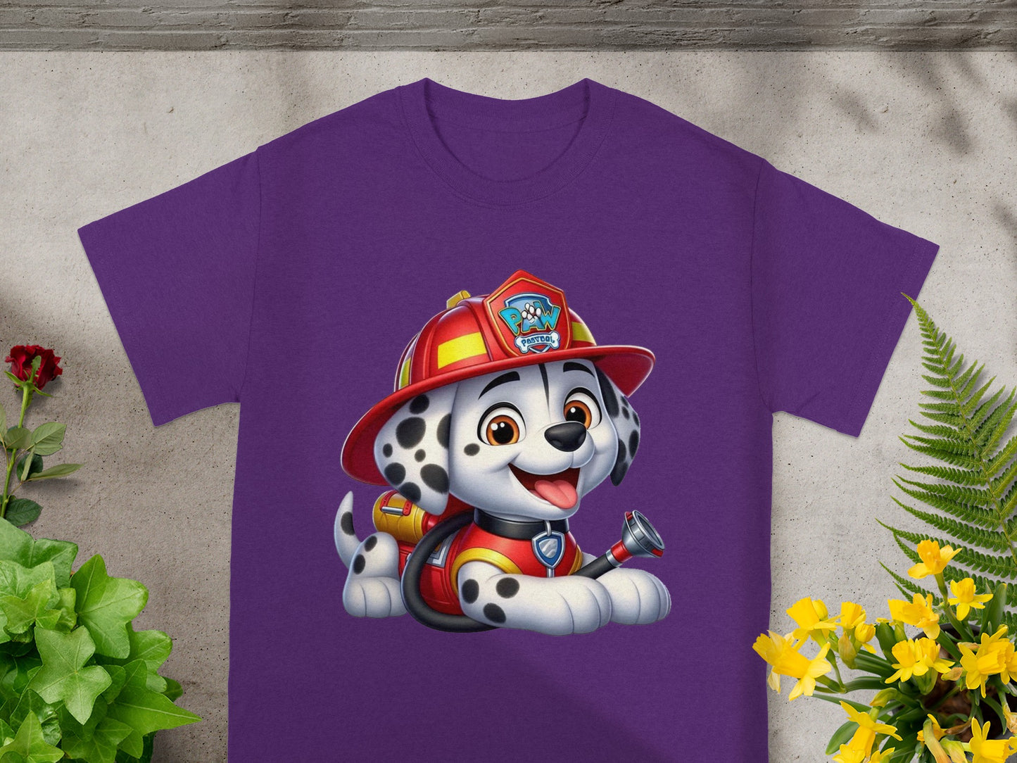 Marshall the Dalmatian from Paw Patrol on a purple t-shirt.