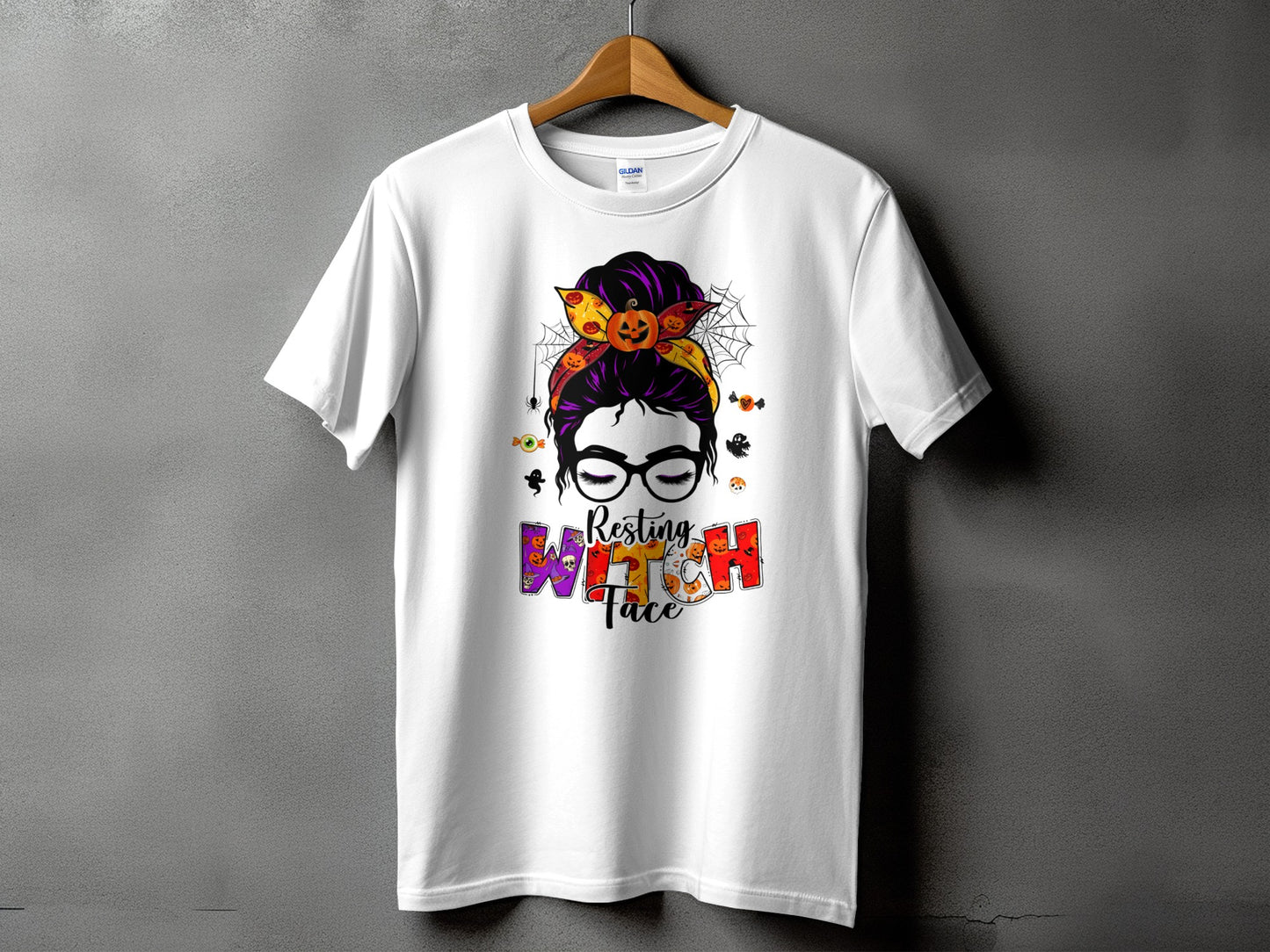 White t-shirt with Halloween graphic reading "Resting Witch Face."