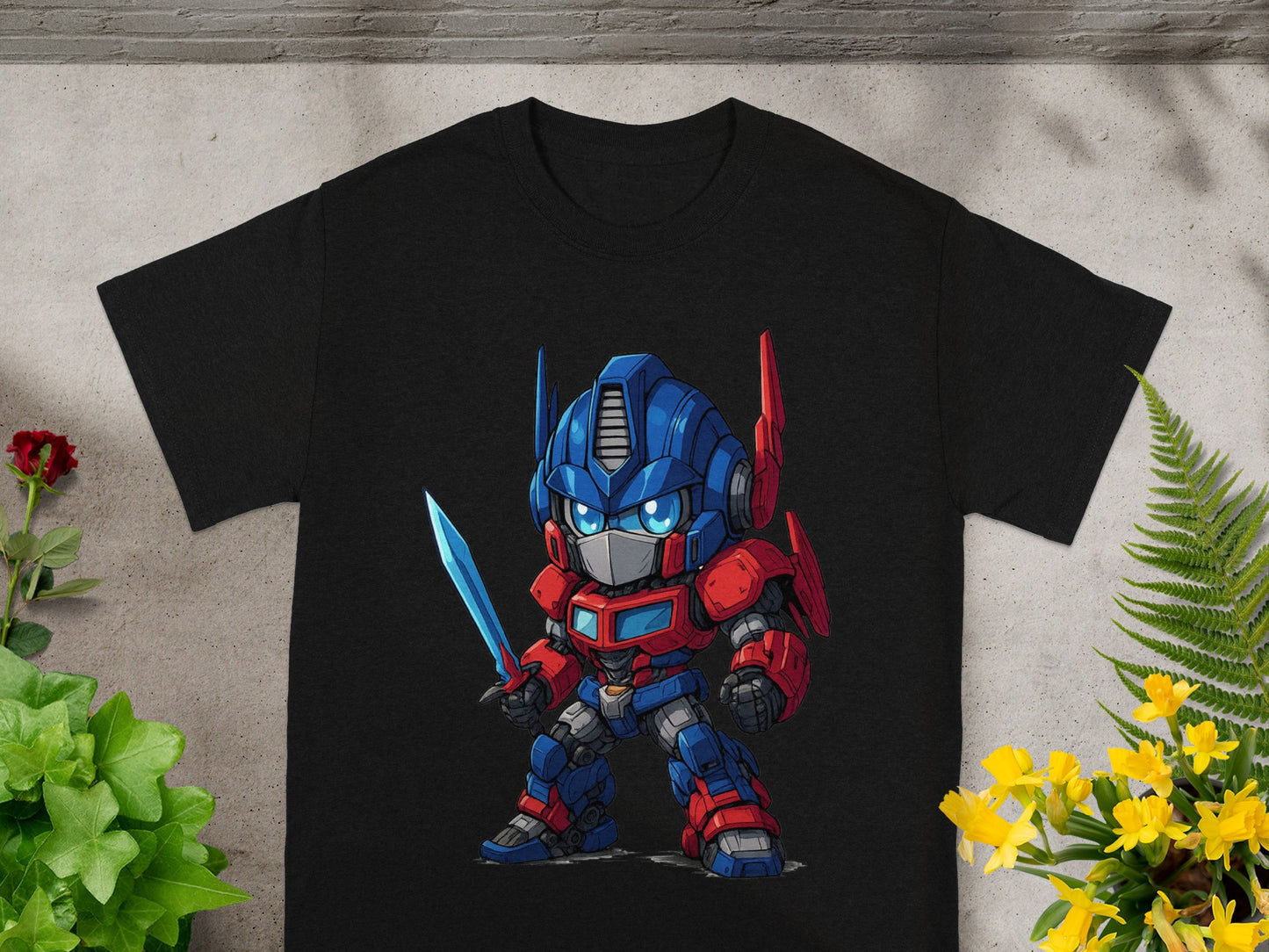 Chibi Optimus Prime with sword on a black t-shirt.