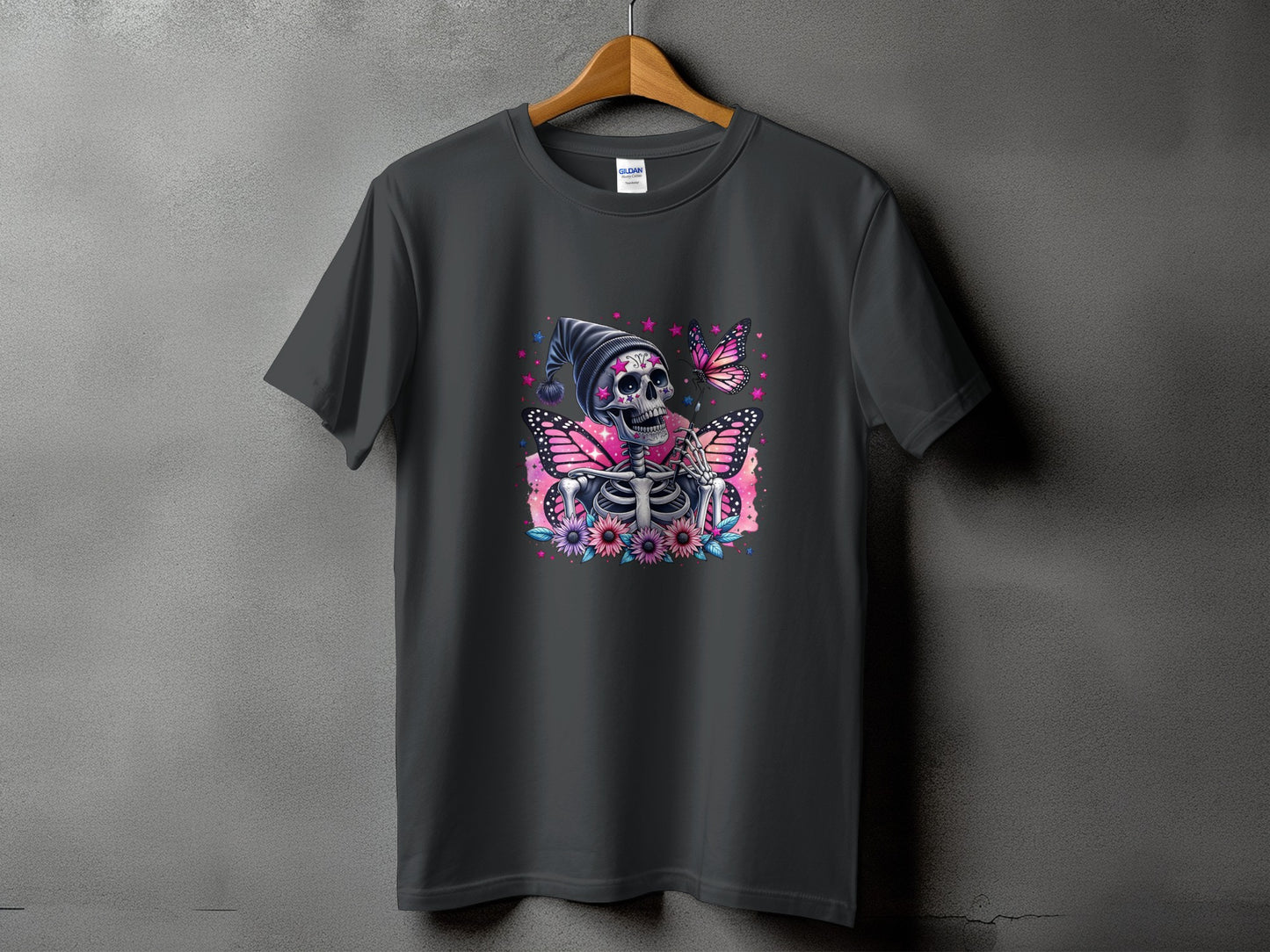 Skeleton with butterfly wings and flowers on a gray t-shirt.