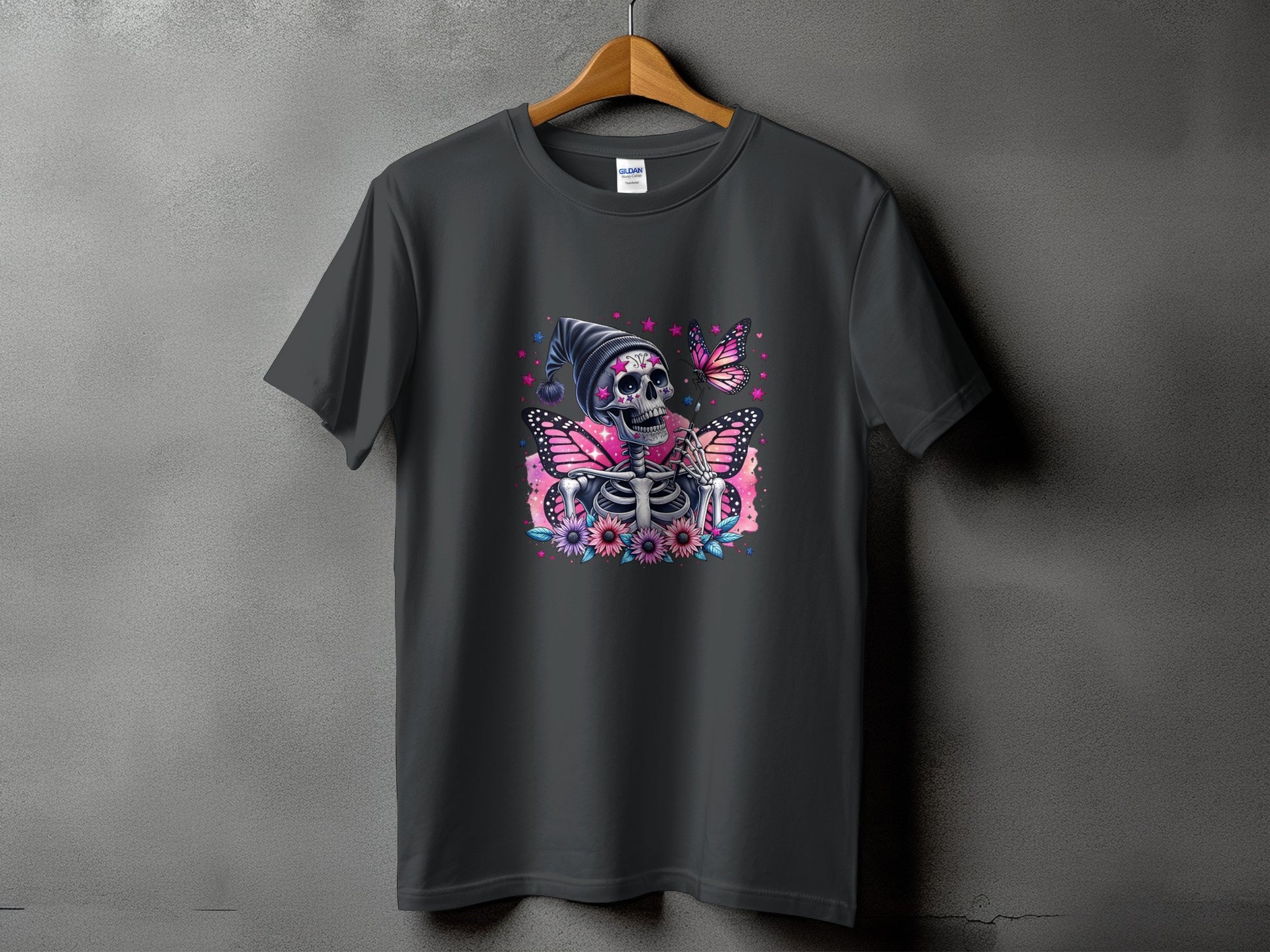 Skeleton with butterfly wings and flowers on a gray t-shirt.