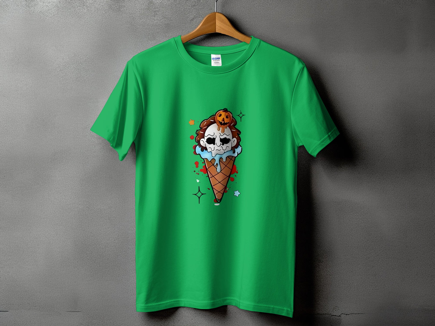 Green t-shirt with a spooky ice cream cone graphic featuring a skull and pumpkin.
