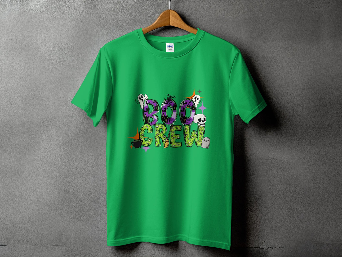 Green t-shirt with "BOO CREW" text and Halloween-themed graphics.