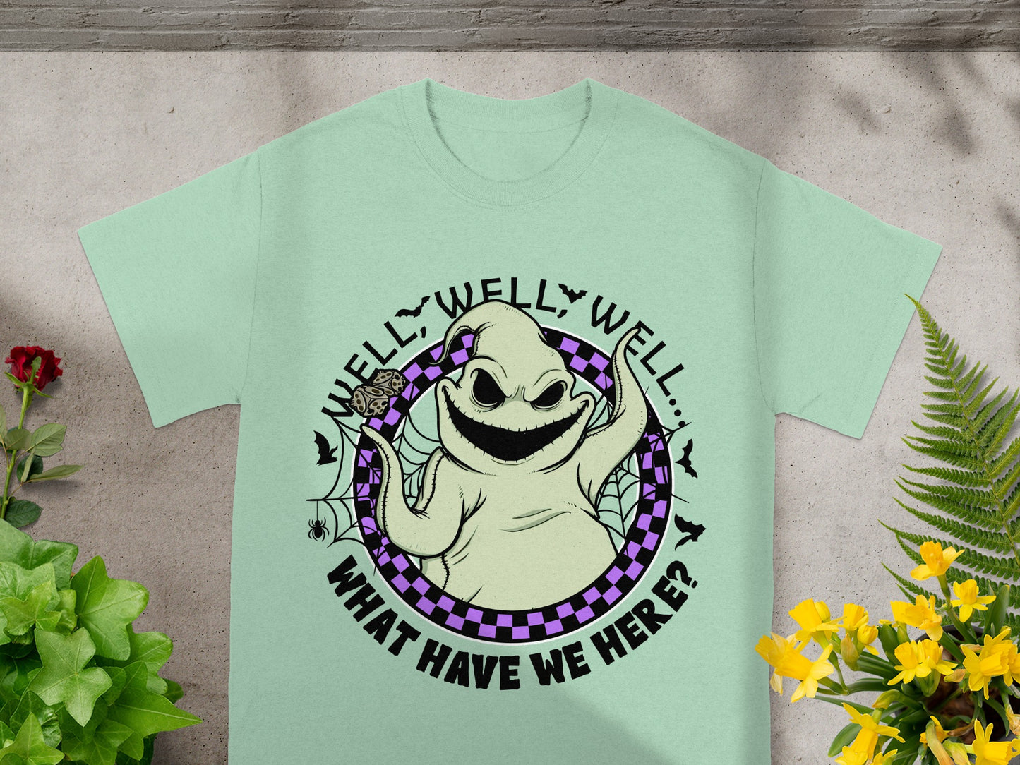 Oogie Boogie character with "Well, well, well... What have we here?" text on t-shirt.