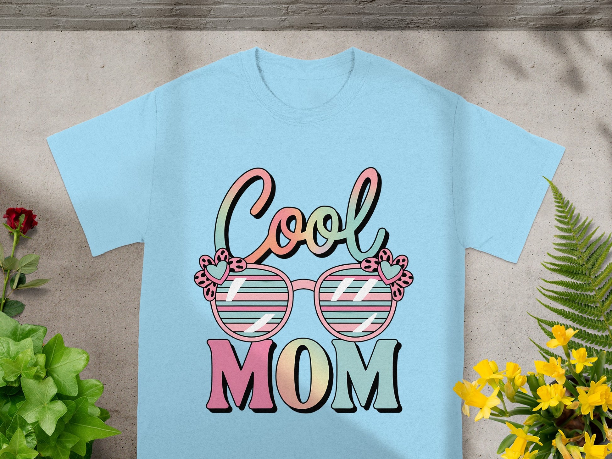 Light blue t-shirt with "Cool MOM" text and sunglasses graphic.