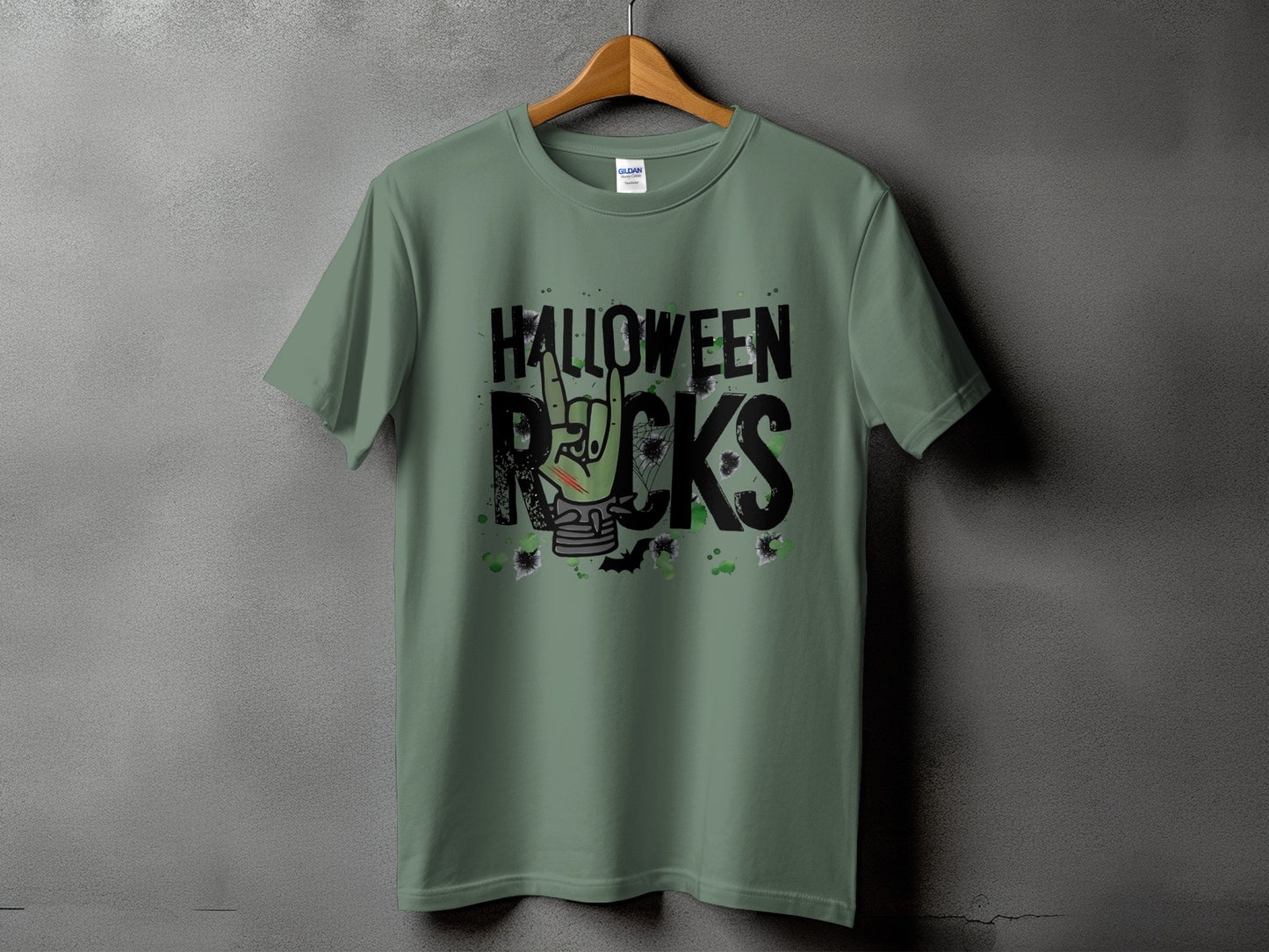 Green t-shirt with "Halloween Rocks" text and spooky graphics.