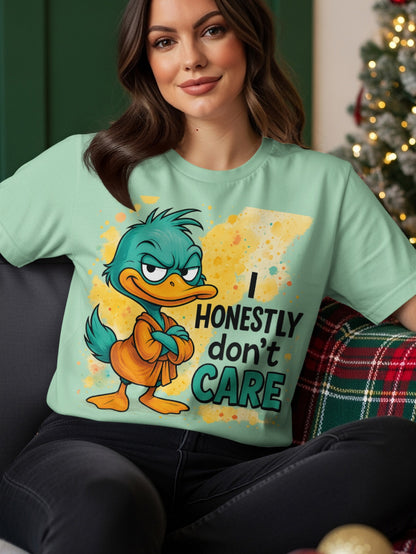 Green t-shirt with cartoon duck wearing orange robe and text "I HONESTLY DON'T CARE".