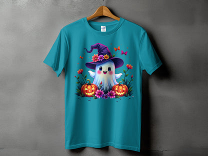 Cute ghost with witch hat, pumpkins, and flowers graphic on a teal t-shirt.