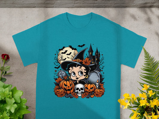 Betty Boop as a witch with pumpkins, skull, and haunted castle Halloween graphic.