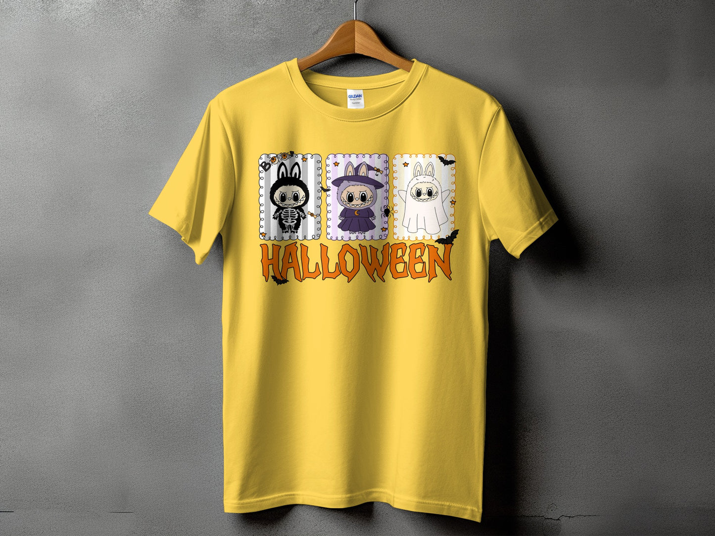 Yellow t-shirt with three cartoon Halloween characters and "HALLOWEEN" text.