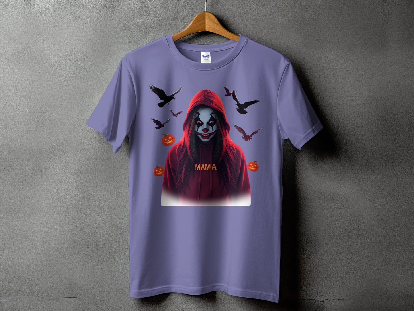 Purple t-shirt with a clown, birds, and pumpkins graphic that says "MAMA."