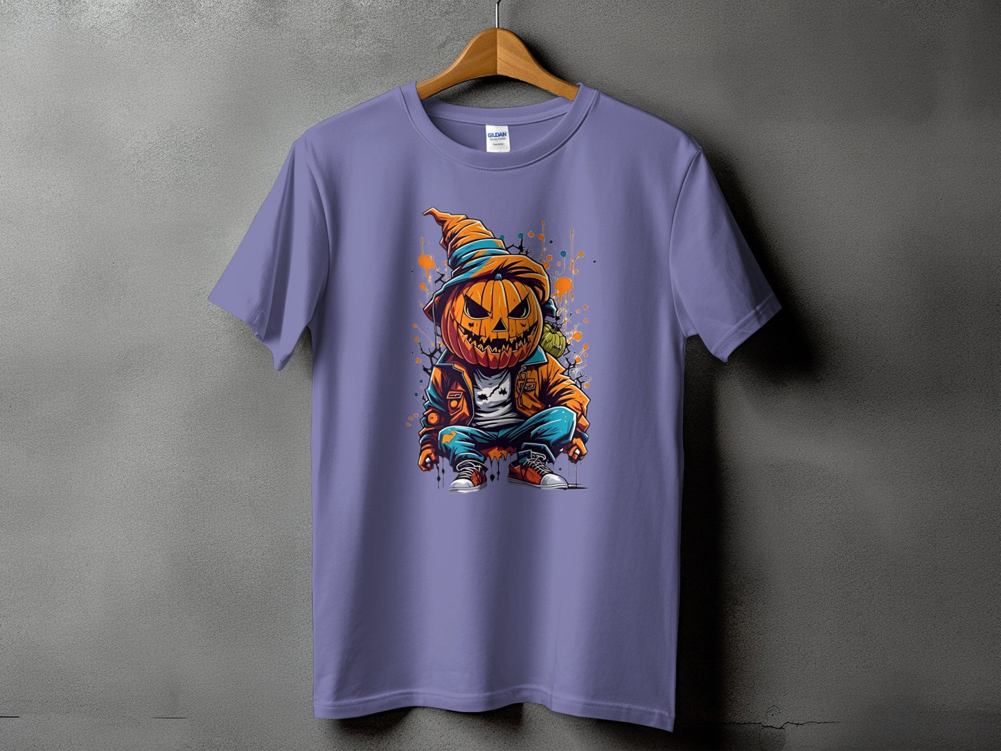Purple t-shirt with a graphic of a jack-o'-lantern character wearing a hat and jacket.