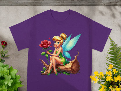Tinkerbell fairy sitting on a log with a rose.