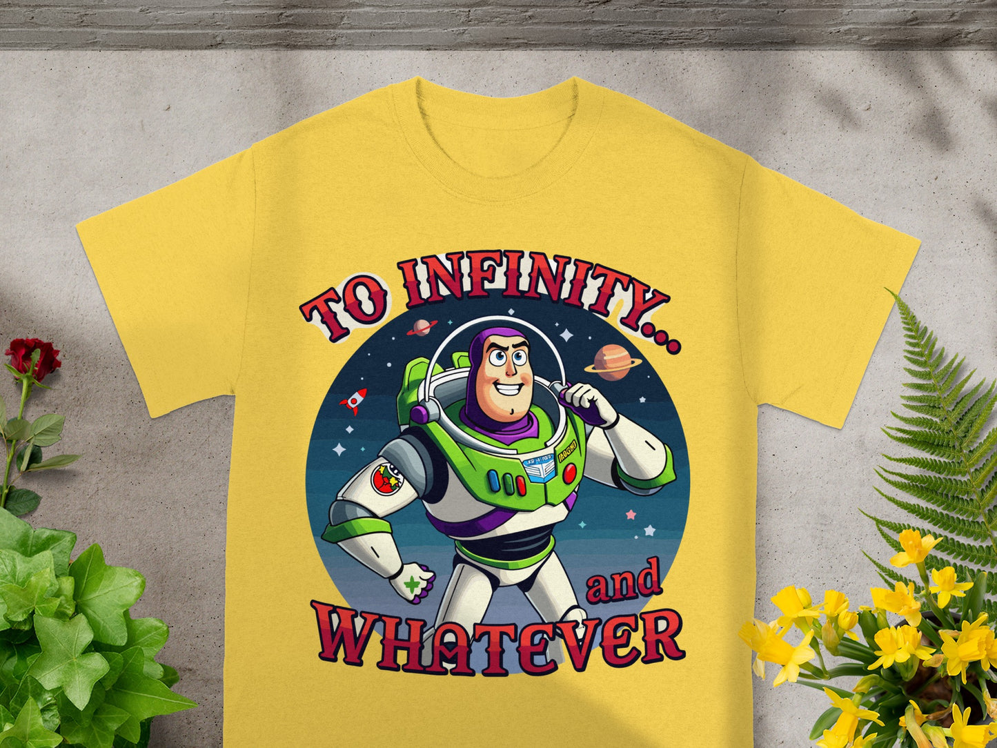Yellow t-shirt with Buzz Lightyear and text "To Infinity... and Whatever".