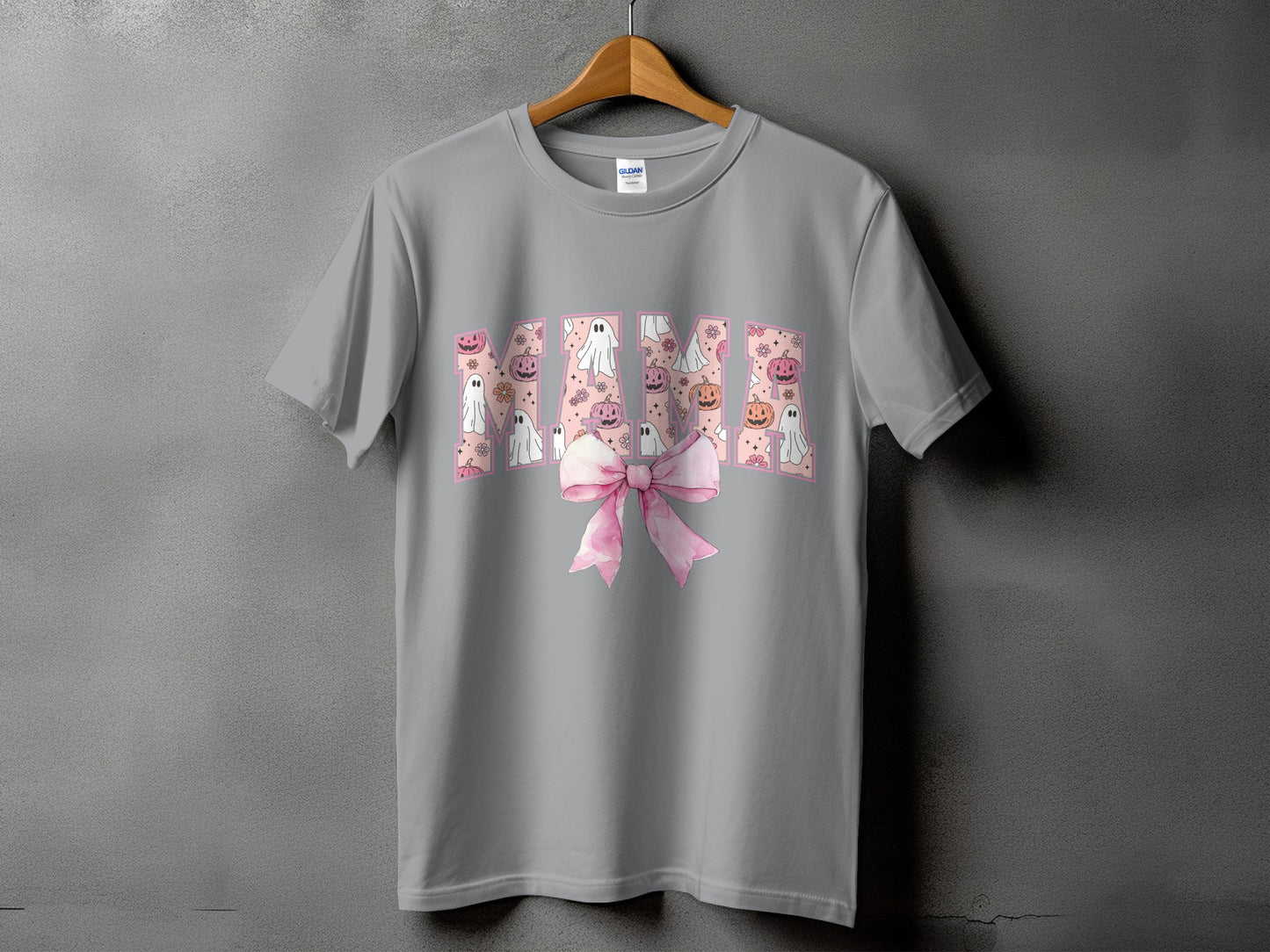 Gray t-shirt with "Mimi" text filled with ghosts and pumpkins, and a pink bow.