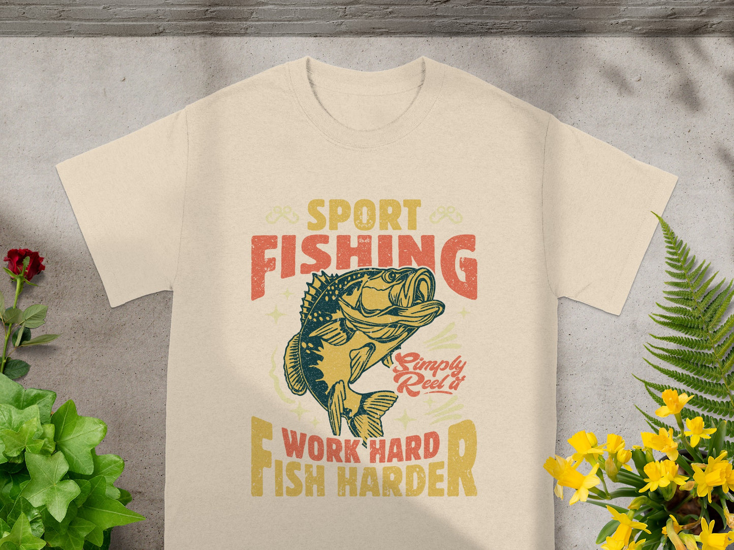 Beige t-shirt with "Sport Fishing," a fish graphic, and "Work Hard Fish Harder."