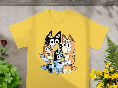 Yellow t-shirt featuring cartoon dogs from Bluey playing together.