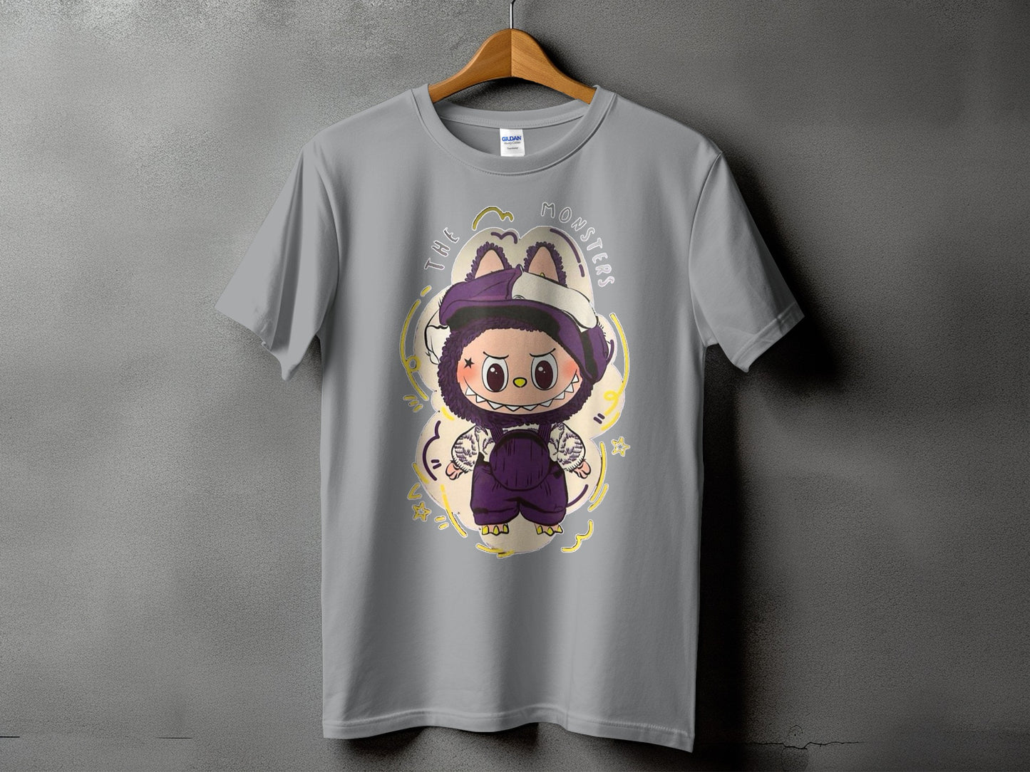 Grey t-shirt with "The Monsters" text and a cartoon monster graphic.